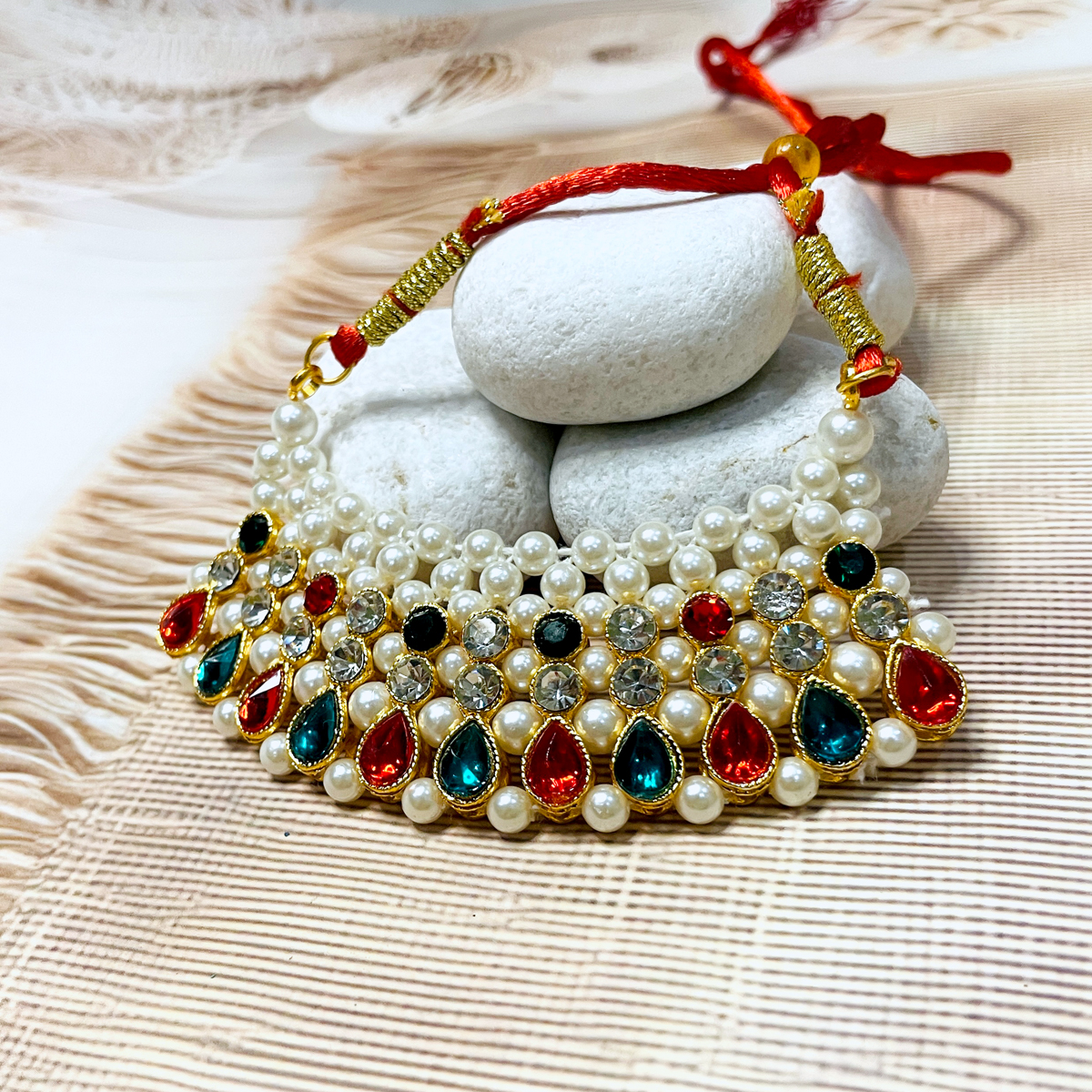 Rangat Choker: Vibrant Pearl & Stone Idol Necklace